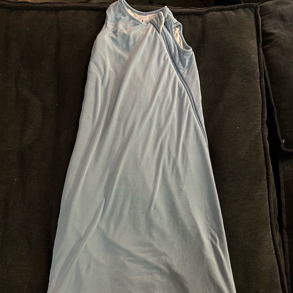 Well loved Kyte Lg 1.0 sleep sack in Stream. Still wearable just well loved!